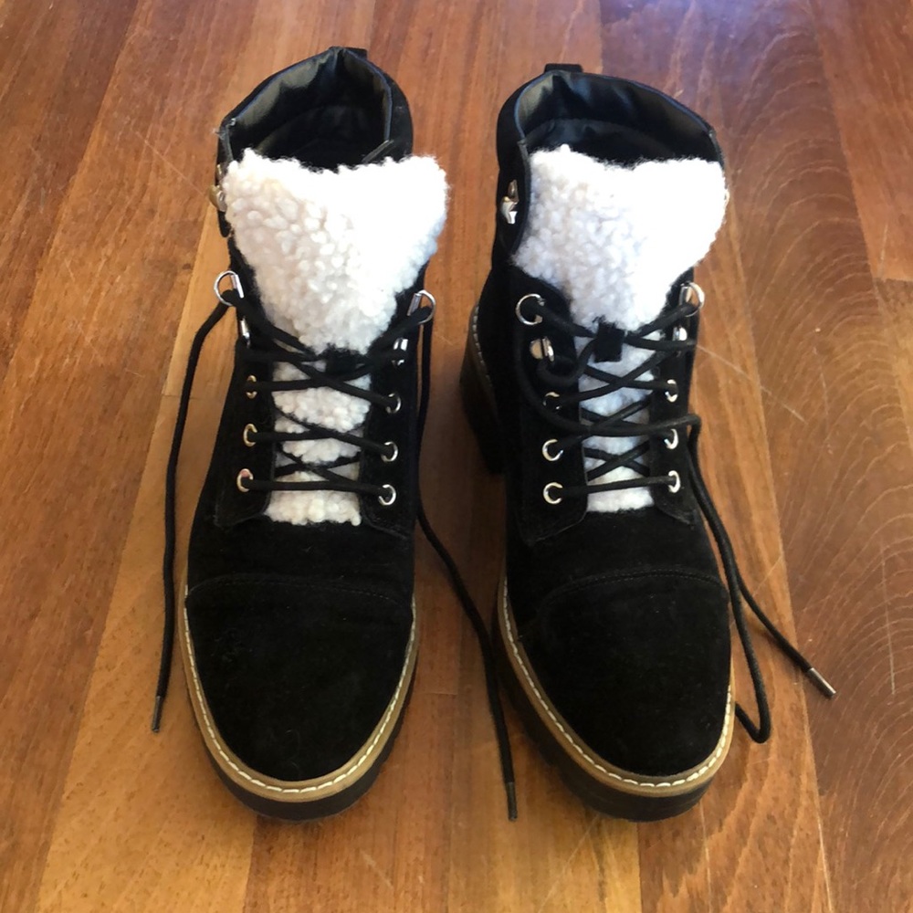 These cute black boots have only been worn once and are in perfect condition.